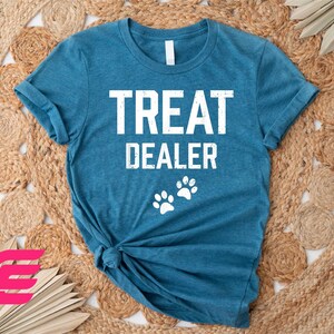a t - shirt that says treat dealer on it