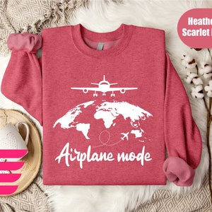 a red shirt with the words airplane mode printed on it