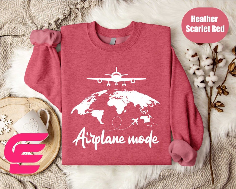 a red shirt with the words airplane mode printed on it