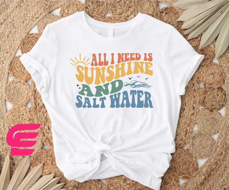 a t - shirt that says all i need is sunshine and salt water