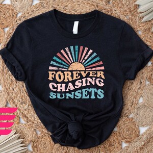 a t - shirt that says forever chasing sunsets