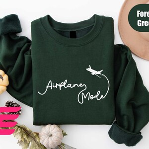 a green sweatshirt with the words american made on it