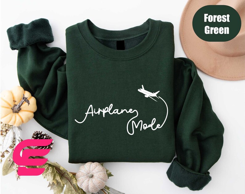 a green sweatshirt with the words american made on it