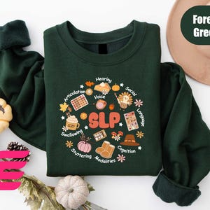 a green shirt with a picture of a bunch of food on it