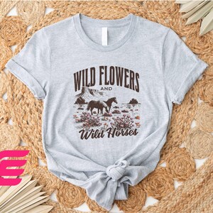 a t - shirt that says wild flowers and wild horses