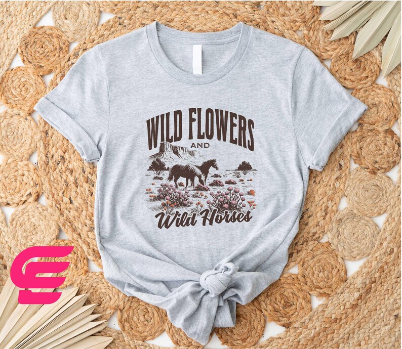 a t - shirt that says wild flowers and wild horses