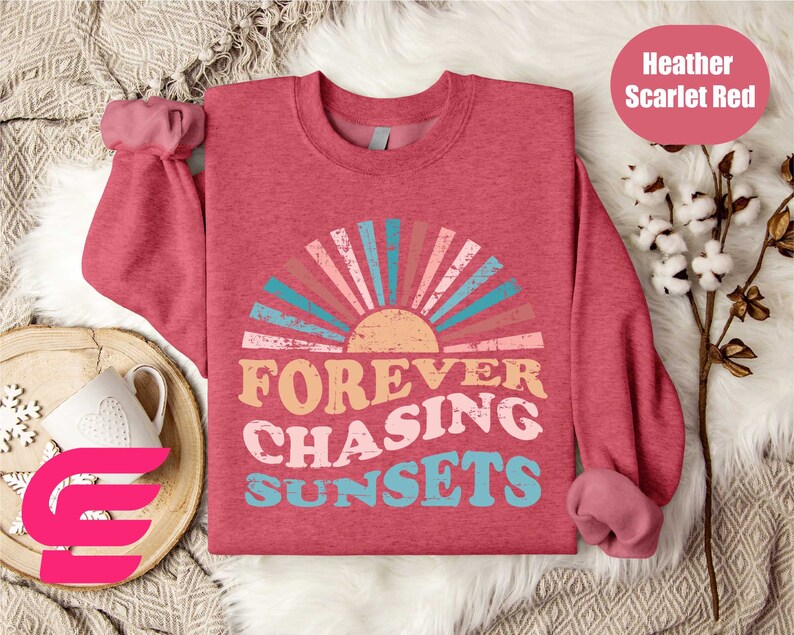 a red shirt with the words forever chasing sunsets on it