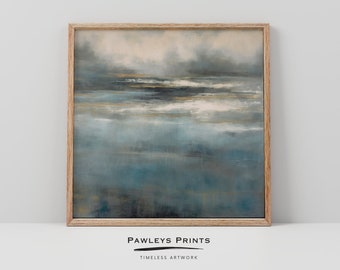 May include: Abstract landscape painting in a wooden frame. The artwork features a blend of blues, grays, and gold accents, evoking a serene, atmospheric scene. The text "PAWLEYS PRINTS - TIMELESS ARTWORK" is printed at the bottom.