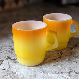 Anchor Hocking FIRE KING Candy Corn colored Yellow and Orange Stackable Milk Glass Coffee Mugs with D Handles ~ Set of 2