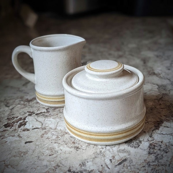 Vintage Yamaka Stoneware Japan Sugar Bowl and Creamer Off White or Cream colored with Brown Speckles and Gold Banded Ridges