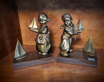 Rare Brass Little Dutch Boy and Dutch Girl with Toy Sailboats - Book Ends