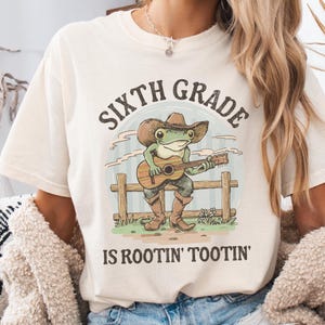 Western Sixth Grade Teacher Shirt, Comfort Colors 6th Grade Teacher T-shirt, Cowboy Frog Teacher Shirt, Funny Back to School Teacher Tee