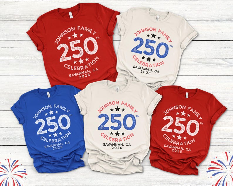 May include: A collection of five short-sleeved t-shirts in red, white, and blue. Each shirt features the text "JOHNSON FAMILY 250 CELEBRATION SAVANNAH, GA 2026" in a circular design with stars.