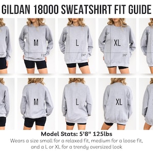 May include: A size guide for the Gildan 18000 sweatshirt, showing front and back views of the garment in sizes S to 2XL. Measurements are provided in inches. The model is 5'8" and 125 lbs. The text "GILDAN 18000 SWEATSHIRT FIT GUIDE" is at the top.