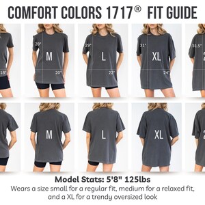 May include: A fit guide for Comfort Colors 1717&reg; t-shirts. The image shows front and back views of the shirts in sizes S, M, L, XL, and 2XL. Measurements are provided in inches. The model is 5'8" and 125lbs.