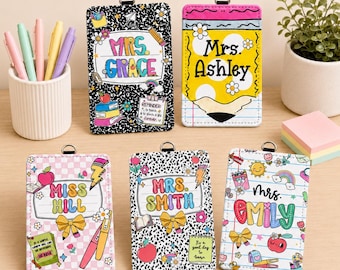 May include: Five rectangular ID badge holders with metal clips, each featuring colorful, personalized designs with names like Mrs. Grace, Mrs. Ashley, Miss Hill, Mrs. Smith, and Mrs. Emily, decorated with school-themed graphics like apples, pencils, and bows.