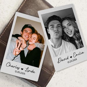 May include: Two personalized photo prints with black and white images of couples. One print reads "Charles Linda 12.05.2025" and the other reads "David Emilia 01.23.2026". The prints are on a brown leather wallet.