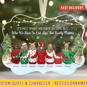 May include: A clear acrylic ornament with a festive design. It features a quote about friendship and illustrations of seven friends in holiday attire. The ornament has a ribbon for hanging and the text "FAST DELIVERY". The bottom text reads "CUSTOM QUOTE & CHARACTER - BESTIES ORNAMENT".