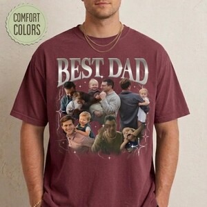 May include: Burgundy t-shirt with the text "BEST DAD" in a silver, retro font. The shirt features a collage of photos of a man with children. The words "COMFORT COLORS" are in a green circle.