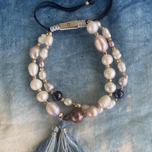 Handcrafted pearl bracelet with tassels