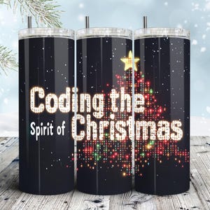 May include: Three black stainless steel tumblers with lids and straws. The tumblers feature the text "Coding the Spirit of Christmas" in a glowing font, with a Christmas tree design made of colourful lights. Snowflakes are scattered around the tumblers.
