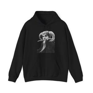 May include: Black hooded sweatshirt with a white and gray image of a man with horns and a long beard.