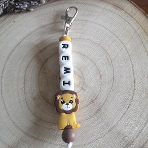 Porte clé perle silicone lion ,personnalisable avec un prénom,superbe idée cadeau