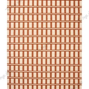 May include: A rectangular rug with a repeating pattern of vertical and horizontal rectangles in a warm brown color against a cream background. The rug's design creates a grid-like appearance, suitable for various interior styles.