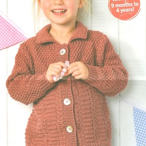 May include: A pink knitted cardigan with a button fastening and a collar. The cardigan is suitable for children aged 9 months to 4 years.