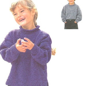 May include: Two children wearing purple and gray knit sweaters with a mock neck. The sweaters have a textured knit pattern.