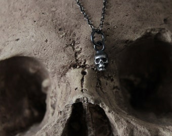 Tiny Silver Skull Pendant
