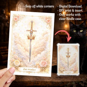 May include: A digital download print featuring a sword and crown design with a cloud background and floral accents. The text "the reader" is at the bottom. The image is designed to be inserted into a clear Kindle case.