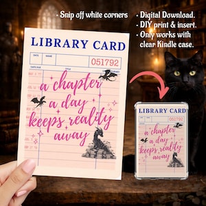 May include: A rectangular paper insert for a clear Kindle case featuring a vintage library card design. The text reads LIBRARY CARD, 051792, and a chapter a day keeps reality away. It includes black dragon illustrations and small star accents.
