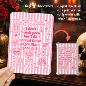 May include: A rectangular pink and white striped Kindle insert featuring the text 'I don't watch porn but I do spread those pages like a good girl' surrounded by illustrations of a skull, books, butterflies, and hands, designed for a clear case.