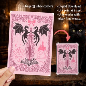 May include: A rectangular pink digital download insert for a clear Kindle case featuring two black dragons flanking a central sword, an open book, a castle, and a bow. Text reads: Snip off white corners, Digital Download, DIY print & insert, Only works with clear Kindle case.