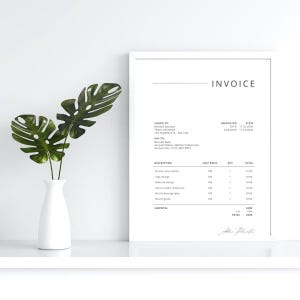 May include: A minimalist white framed invoice with the word "INVOICE" at the top. The invoice includes details such as the invoice number, date, and a list of services. A white vase with green leaves sits to the left.