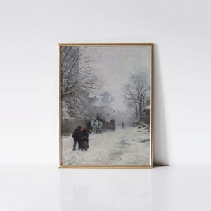 May include: A framed vintage winter landscape painting. The artwork depicts a snow-covered road with figures, a horse-drawn carriage, and buildings. The color palette is muted with shades of gray, white, and brown. The frame is gold.