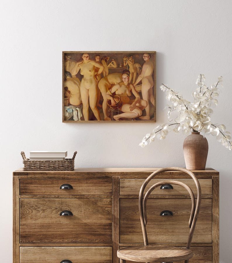 May include: A framed artwork depicting a classical scene of nude figures in a bathhouse setting. The painting features warm tones and detailed figures, mounted on a light-colored wall above a wooden dresser.