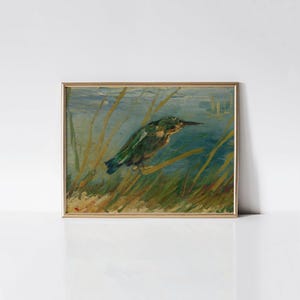 May include: A framed painting of a bird perched on a branch amidst tall grass. The artwork features a palette of blues, greens, and yellows, with the bird's plumage detailed in shades of green and brown. The painting is set against a blue background, suggesting a waterside scene.