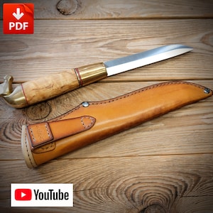 May include: A brown leather sheath with a metal snap and a brown wooden handled knife with a brass guard and a silver blade.