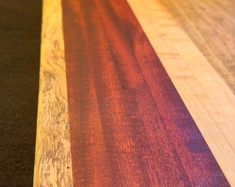 Bloodwood, Spalted Tamarind, and White Limba Cutting Board