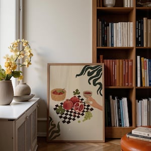 Portrait wooden frame mockups leaning against an oak bookcase in a cozy Scandinavian-style reading nook — soft natural window light, hardwood floor, decorative vases and orchids on a console; styled home decor and print mockups for listings.