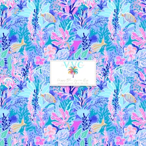 May include: A vibrant, colorful pattern featuring an underwater scene with fish, coral, and aquatic plants in shades of blue, pink, and purple. The design includes the text "Poppy Blue Summer Rays" and the brand name "VVC Days".