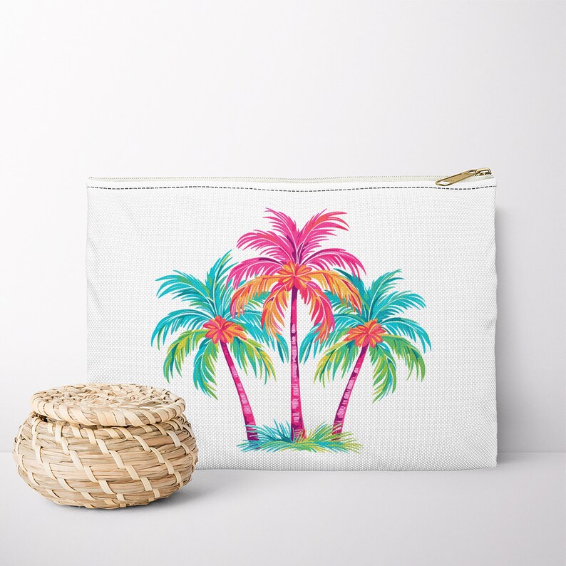 May include: White canvas zippered pouch with a colorful tropical palm tree design. The palm trees are pink, orange, yellow, green, and blue.