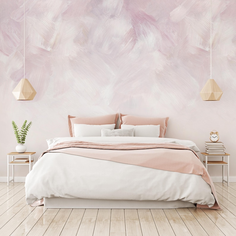 Blush pink abstract brushstroke wallpaper mural with soft painted texture on white; removable peel-and-stick design for bedrooms.