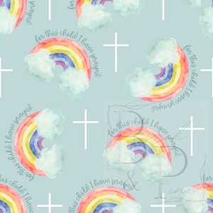 May include: A repeating pattern featuring watercolor rainbows with fluffy clouds and white crosses on a light blue background. The text "for this child I have prayed" is written around each rainbow. The design is suitable for baby or children's products.