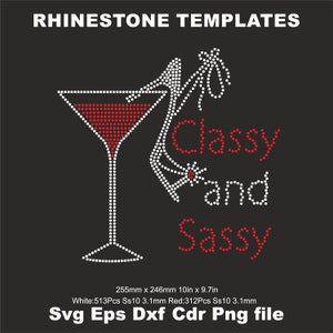 May include: Rhinestone template design featuring a martini glass with a red liquid and a high heel shoe with the text "Classy and Sassy" in red rhinestones. The design measures 10 inches by 9.7 inches.