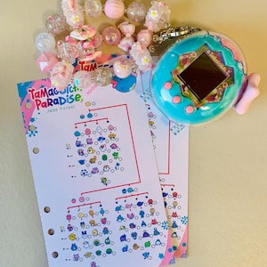 May include: A teal Tamagotchi virtual pet with a pink bow, next to a beaded bracelet with pink and clear beads. Two sheets of paper with a chart of Tamagotchi characters are also present.