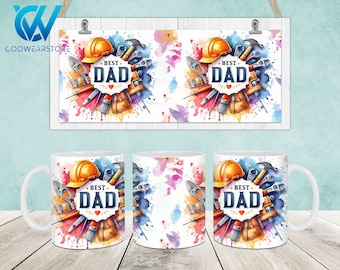 May include: Two white mugs with a colorful design featuring a hard hat, tools, and the text "Best Dad" in a circle. The mugs are on a wooden surface.