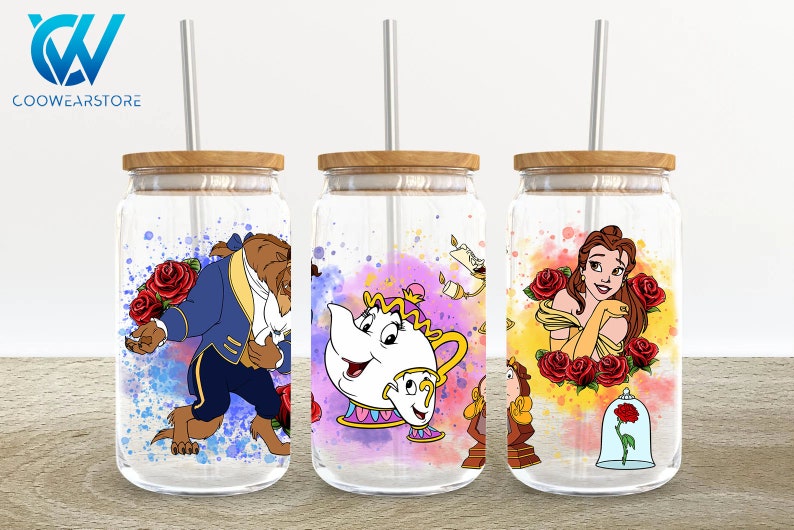 May include: Three clear glass tumblers with lids and straws. Each tumbler features a different character from the Disney movie Beauty and the Beast. The first tumbler features the Beast, the second tumbler features Mrs. Potts, and the third tumbler features Belle. The tumblers are decorated with watercolor-style backgrounds and roses.